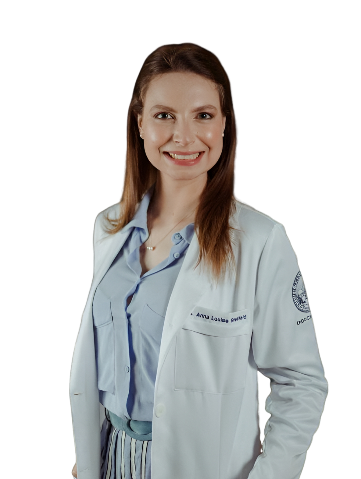 Dra. Anna Louise Stellfeld - Mulher de pele clara, cabelos e olhos castanhos claros.