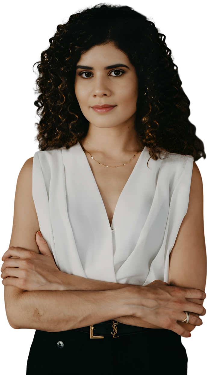 Dr. Aurea Magalhães - Mulher de pele clara, cabelos e olhos castanhos.